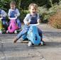 Mobile Preview: Slex RodeoBull Rutschfahrzeug in blau mit Kind