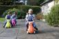 Preview: Slex RodeoBull Rutschfahrzeug in orange mit Kind